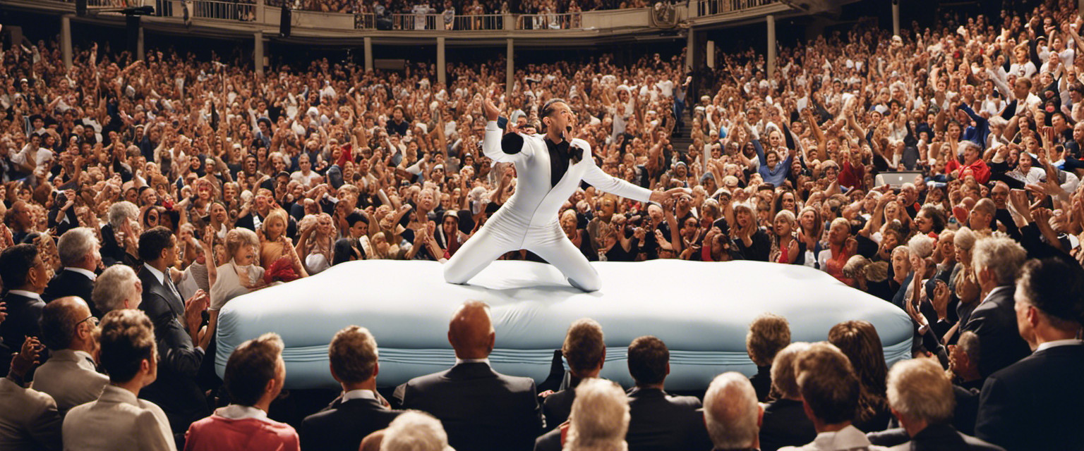 An image showcasing a wide-eyed contestant, clad in a spandex suit, gracefully mid-air with arms and legs splayed, executing a complex mattress flop technique, surrounded by a sea of cheering spectators, with a panel of perplexed judges in the foreground